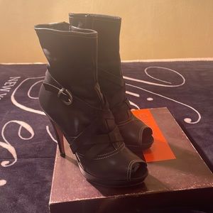Women’s Balmain black leather ankle heeled boots. Size 37